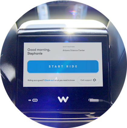 Waymo in-car screen showing destination and "Start Ride" option
